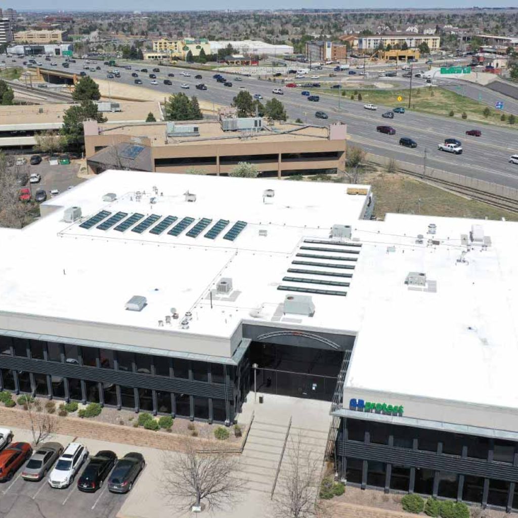 An aerial view of a university commercial roofing project.