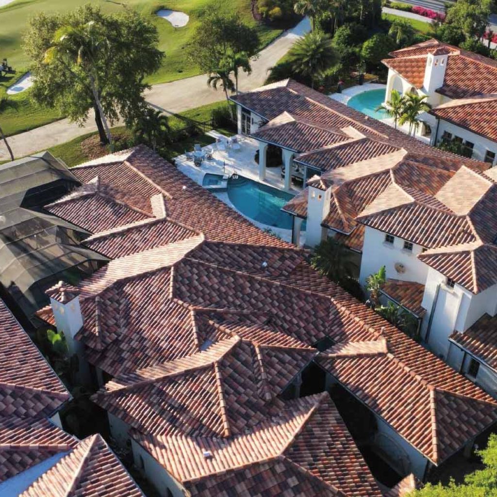 An aerial view of a multi-family roofing project in Naples, Florida.