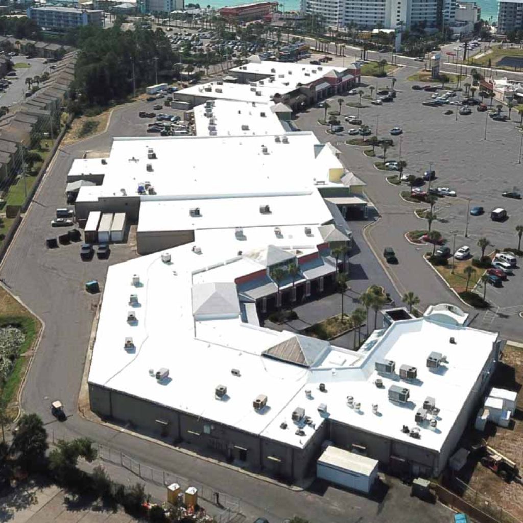 An aerial view of shopping plaza project by ECO Roof and Solar in Florida.